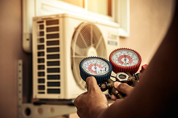 Professional Air Conditioning Service technician working in Lebanon, IN